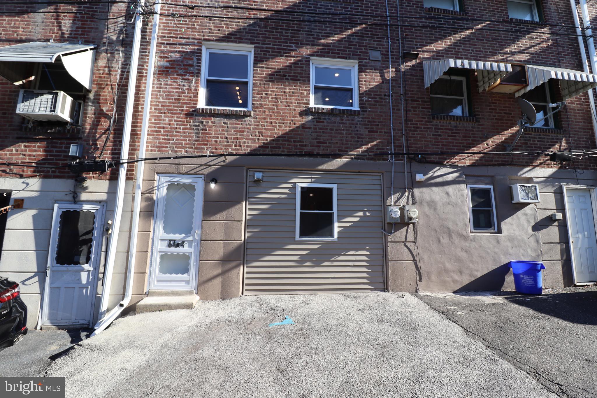 428 Littlecroft Road Upper Darby, PA 19082 - Photo 23 of 25 Rear entrance to basement with parking slab.