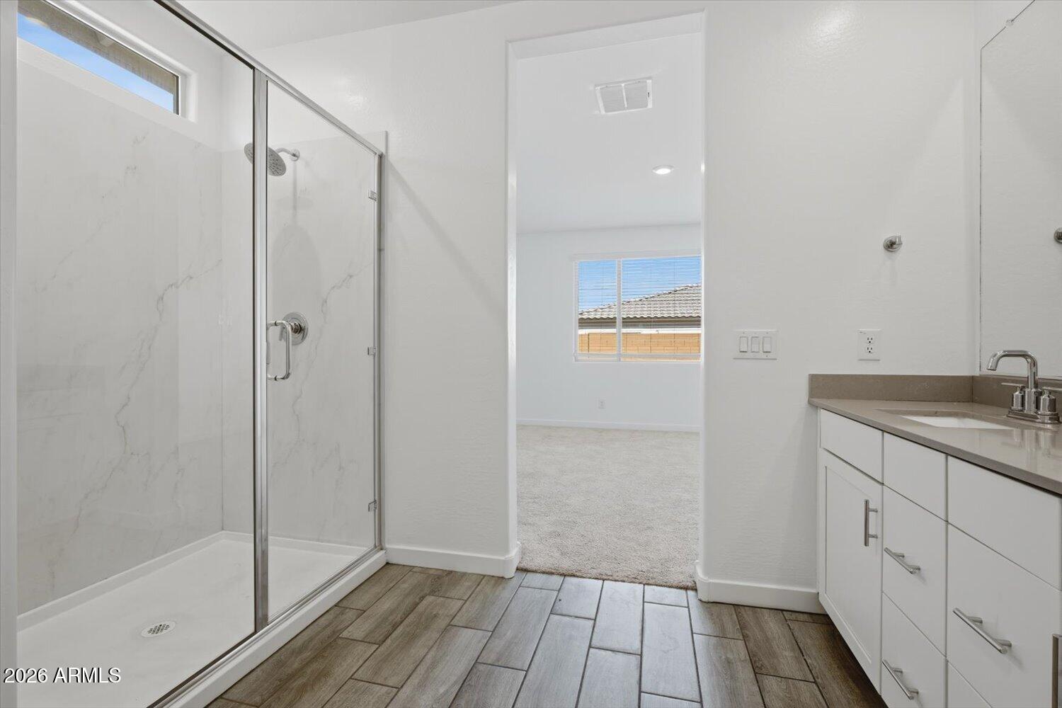 2542 West Pecan Road Phoenix, AZ 85041 - Photo 16 of 30 a bathroom with a sink and shower