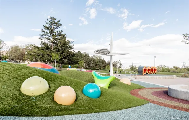 a swimming pool with chairs