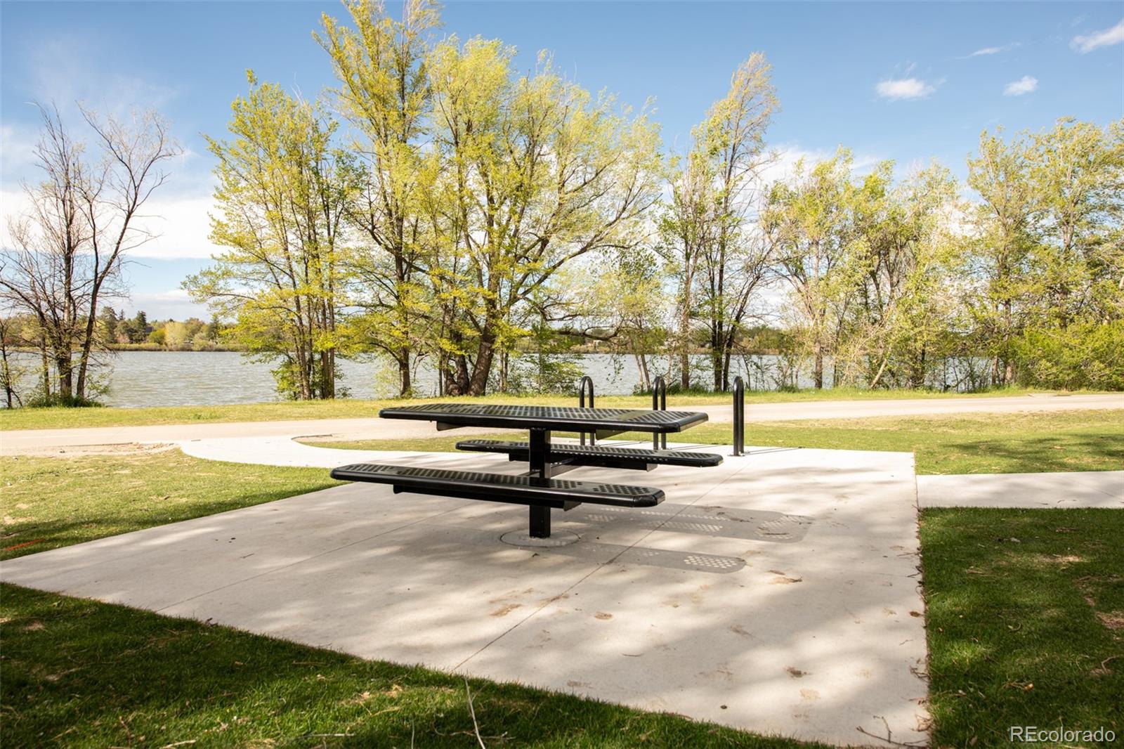 903 Wolff Street Denver, CO 80204 - Photo 9 of 49 a view of a swimming pool with an outdoor space and seating area