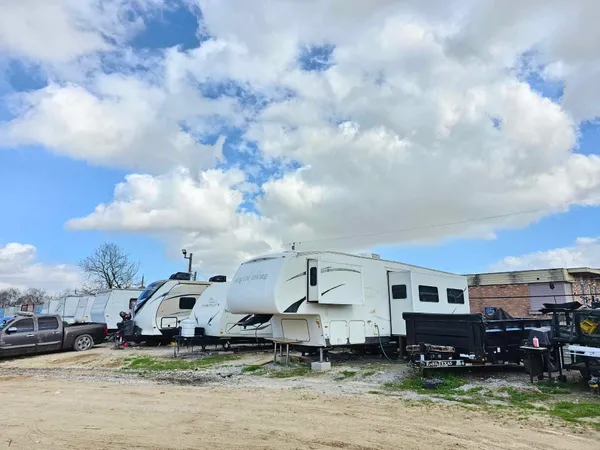 a view of a big house next to a big yard