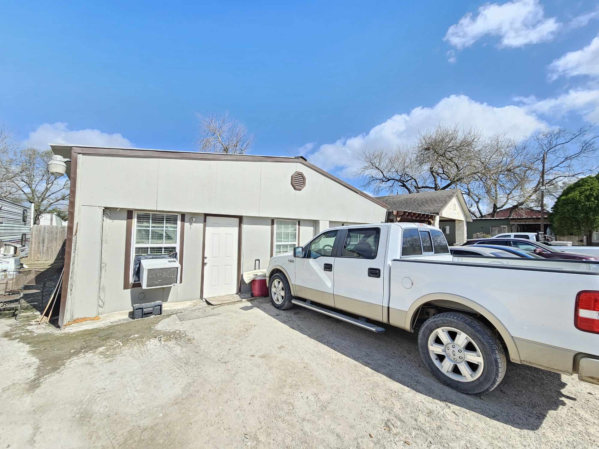 1502 1/2 Jenkins Road Pasadena, TX 77506 - Photo 5 of 15 a car parked in front of a house