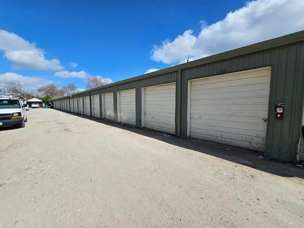a view of parking space in front of house