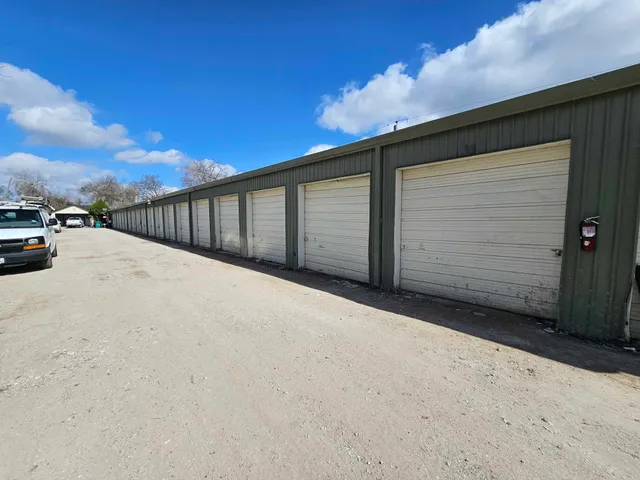 a view of parking space in front of house