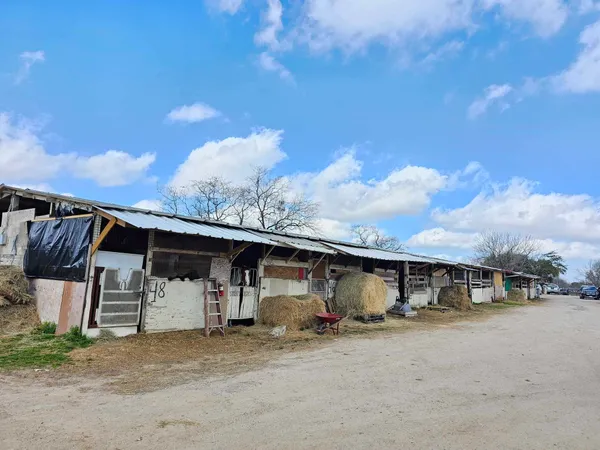 a view of parking garage with cars