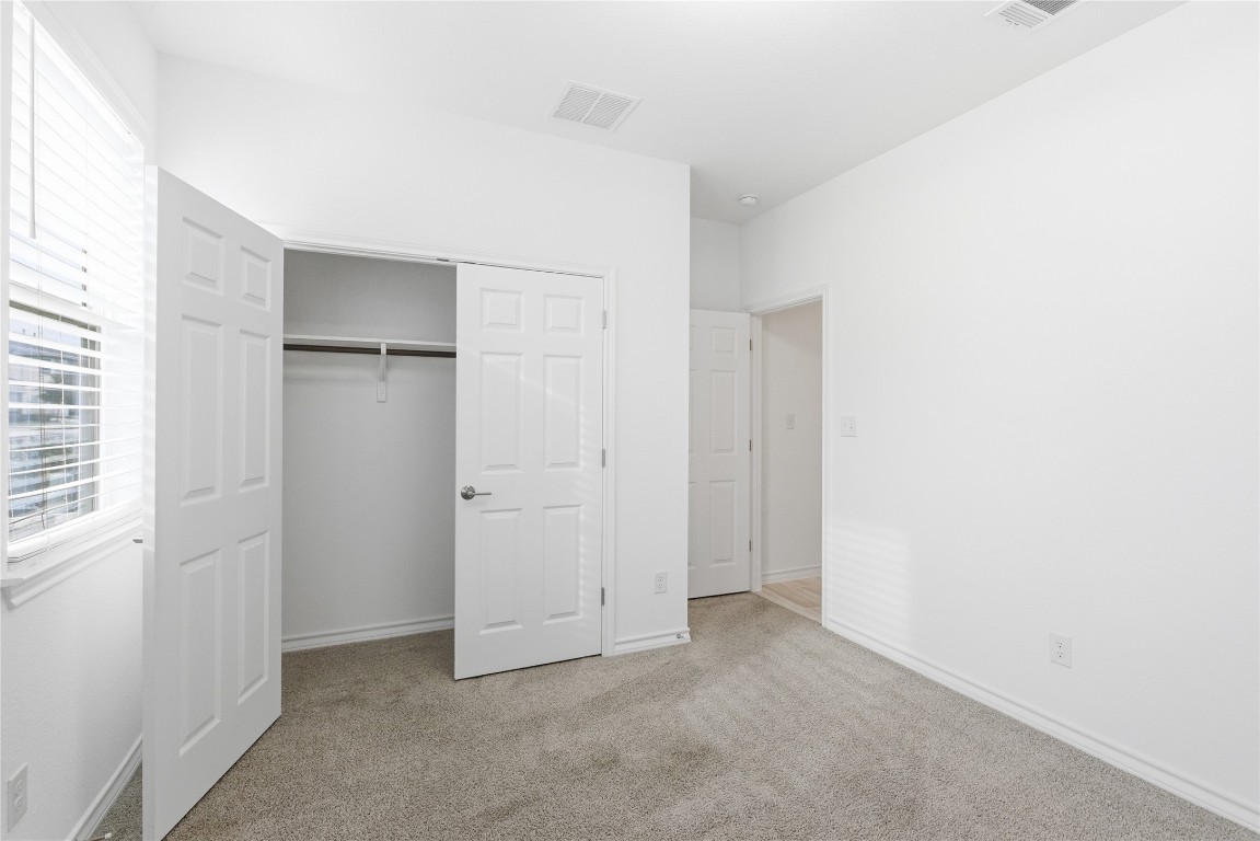 209 Thurman Holt Road Hutto, TX 78634 - Photo 14 of 32 a view of an empty room