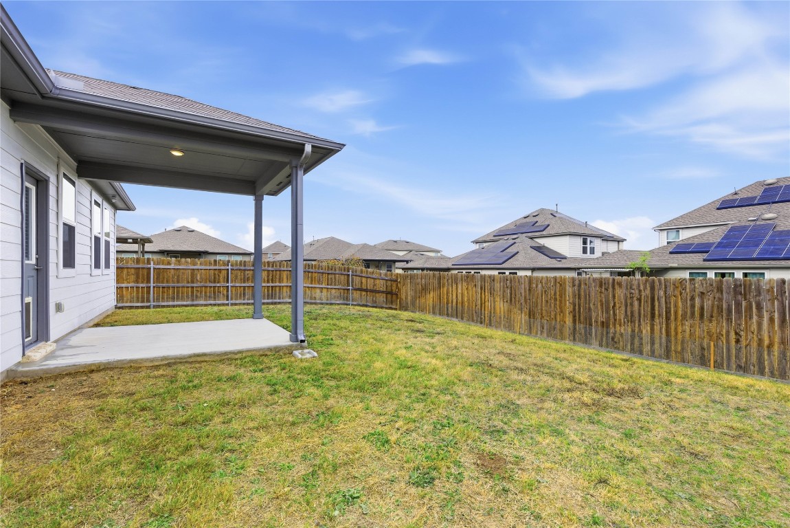 209 Thurman Holt Road Hutto, TX 78634 - Photo 23 of 32 a view of a backyard