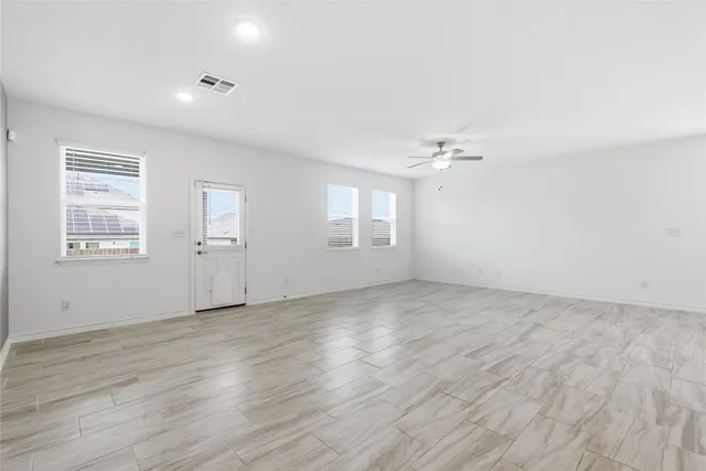 a view of kitchen with cabinets and wooden floor