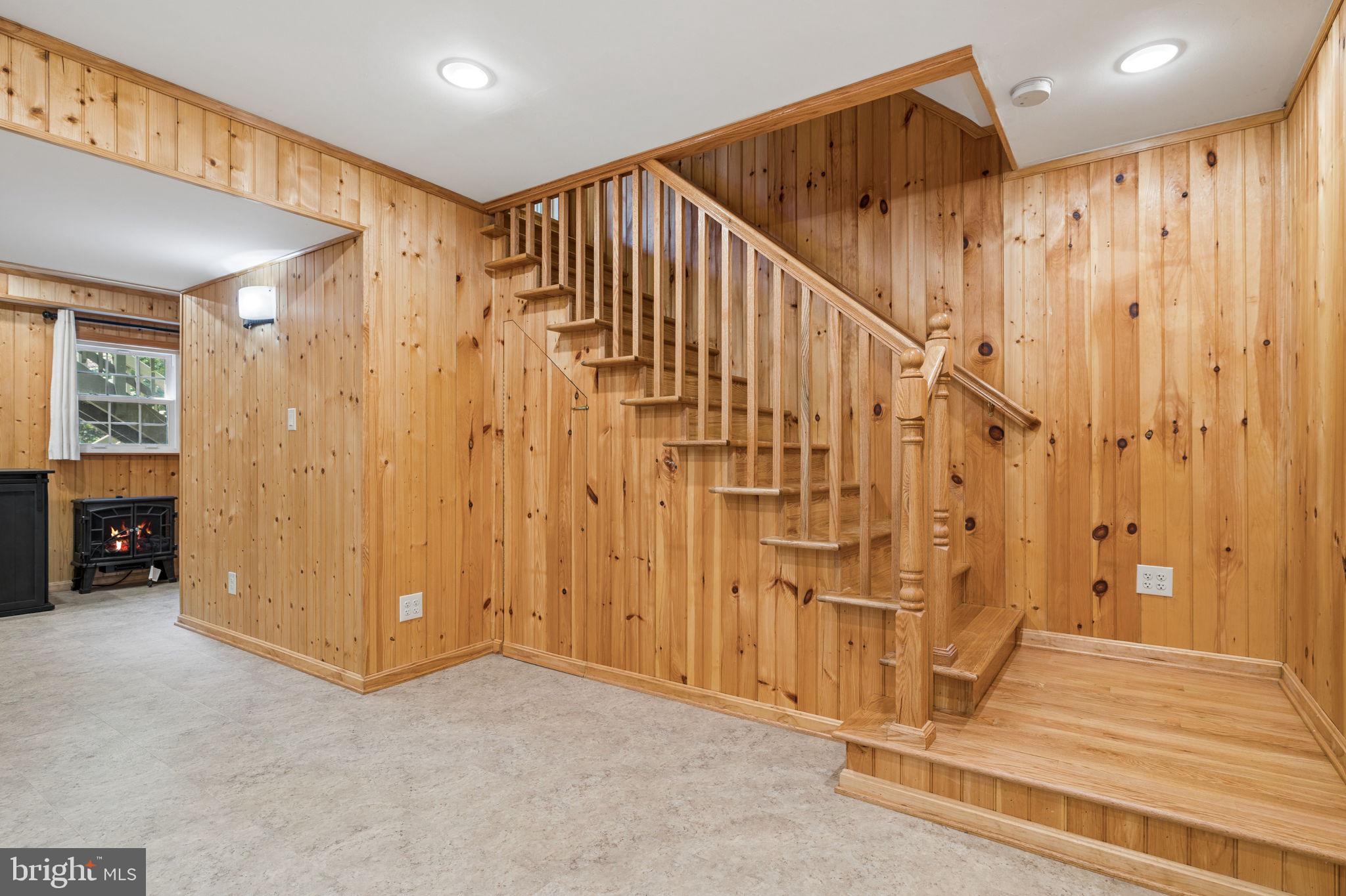 8099 Counselor Road Manassas, VA 20112 - Photo 40 of 82 Custom Pine panelling adorns the basement!