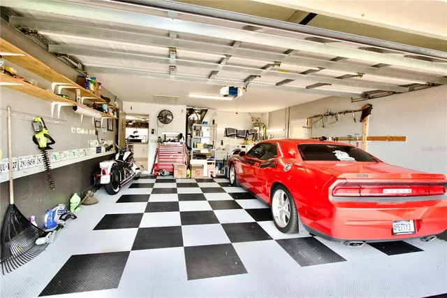 a view of a livingroom with a couch and a large window