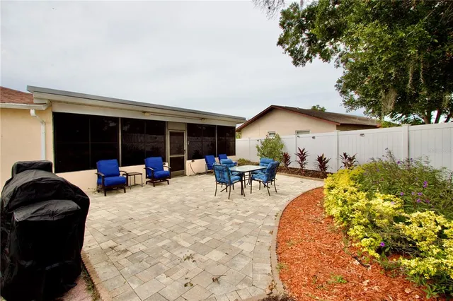 a view of a house with a snow on the road