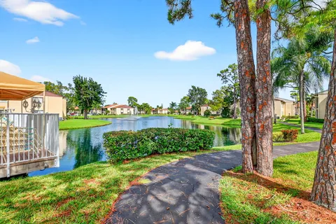 a view of a garden with a lake