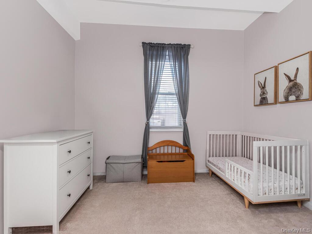 245 Rumsey Road, Unit 20 Yonkers, NY 10701 - Photo 13 of 14 a view of an empty room with a window