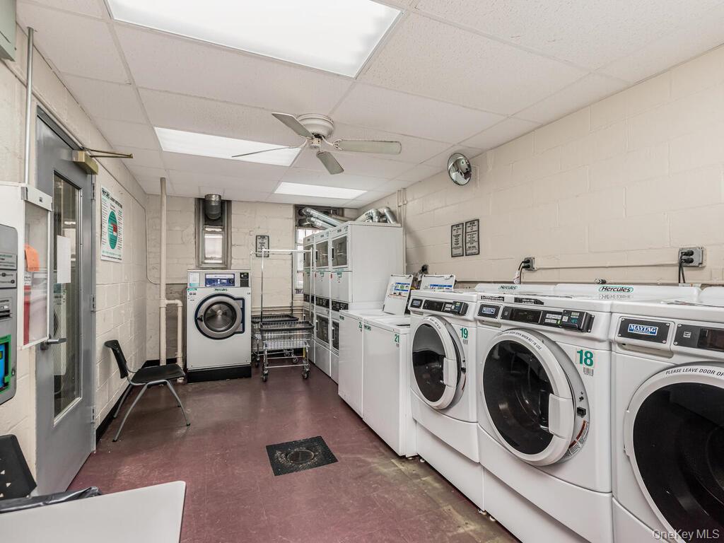 245 Rumsey Road, Unit 20 Yonkers, NY 10701 - Photo 3 of 14 a view of a storage & utility room with dryer and washer
