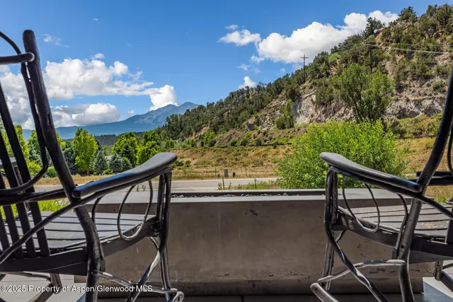 a kitchen with a stove and a sink