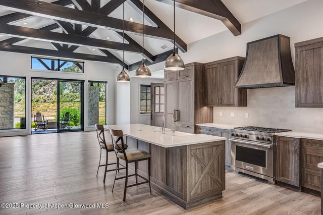 a view of a lake with a yard