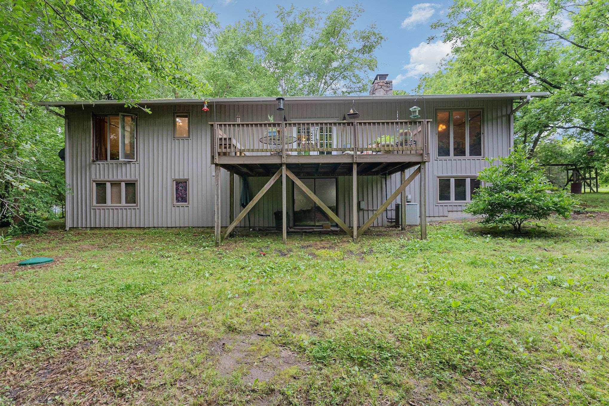 425 Sledge Road Louisburg, NC 27549 - Photo 24 of 30 a front view of a house with garden