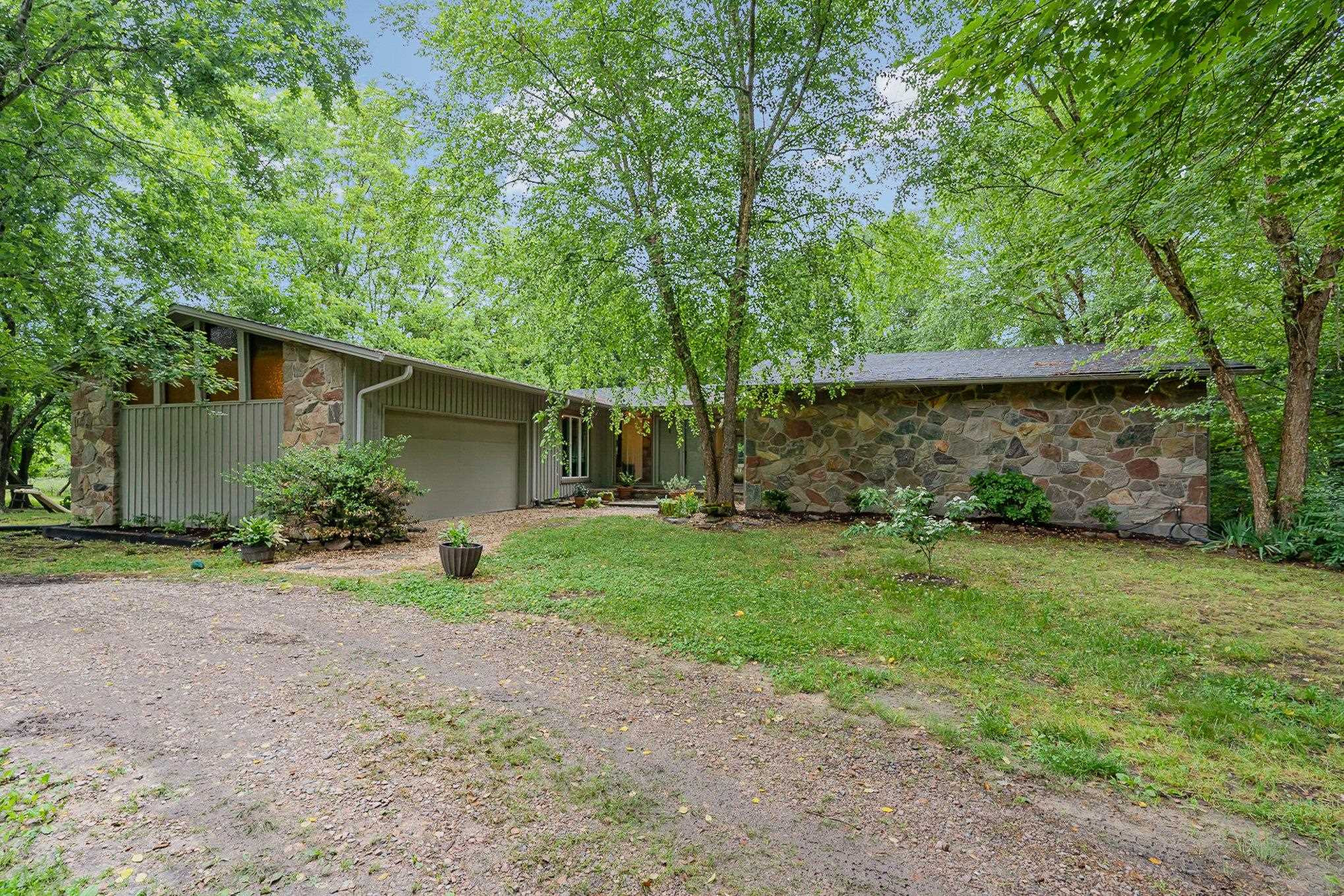 425 Sledge Road Louisburg, NC 27549 - Photo 3 of 30 a view of a back yard with green space