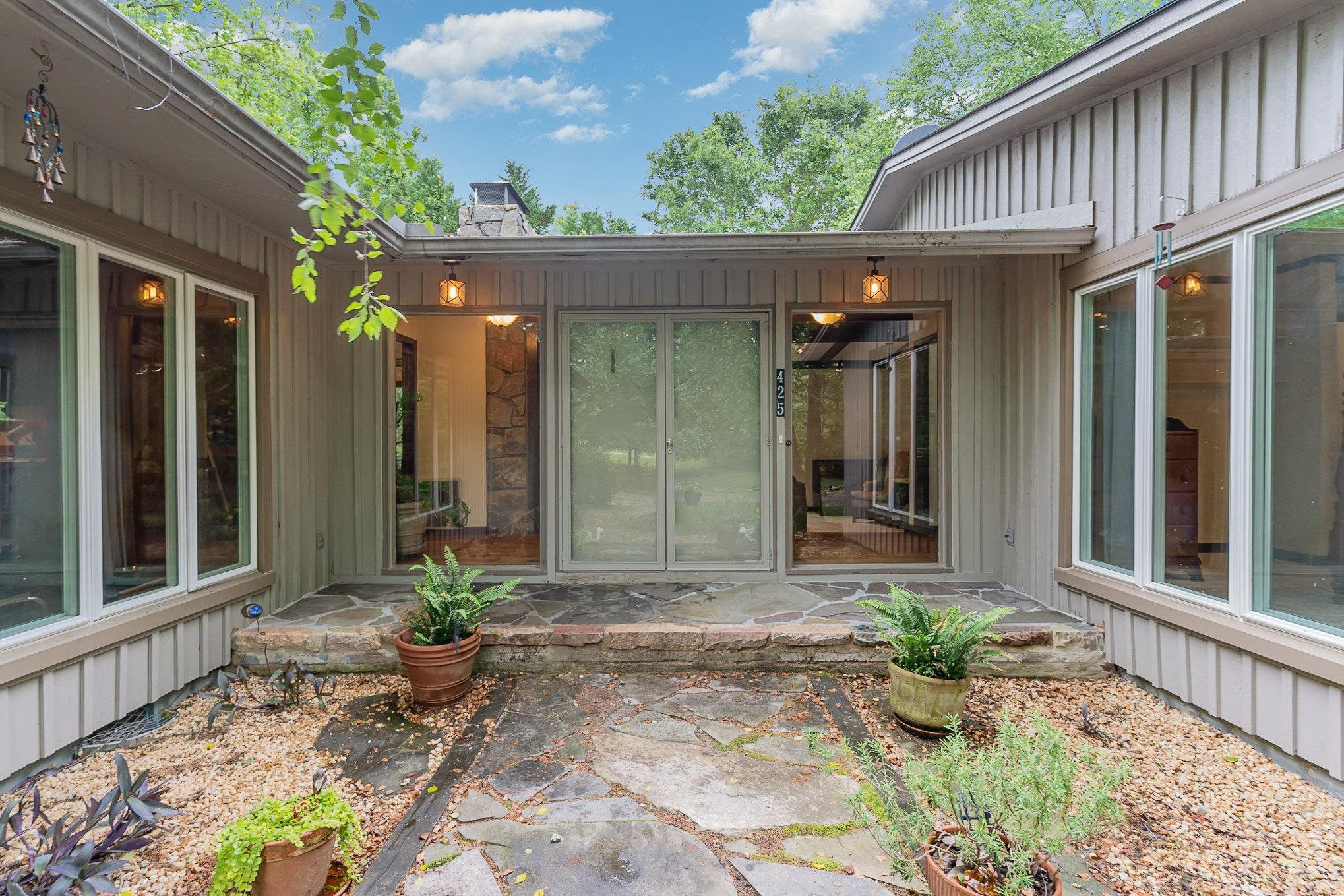 425 Sledge Road Louisburg, NC 27549 - Photo 4 of 30 a front view of a house with a yard
