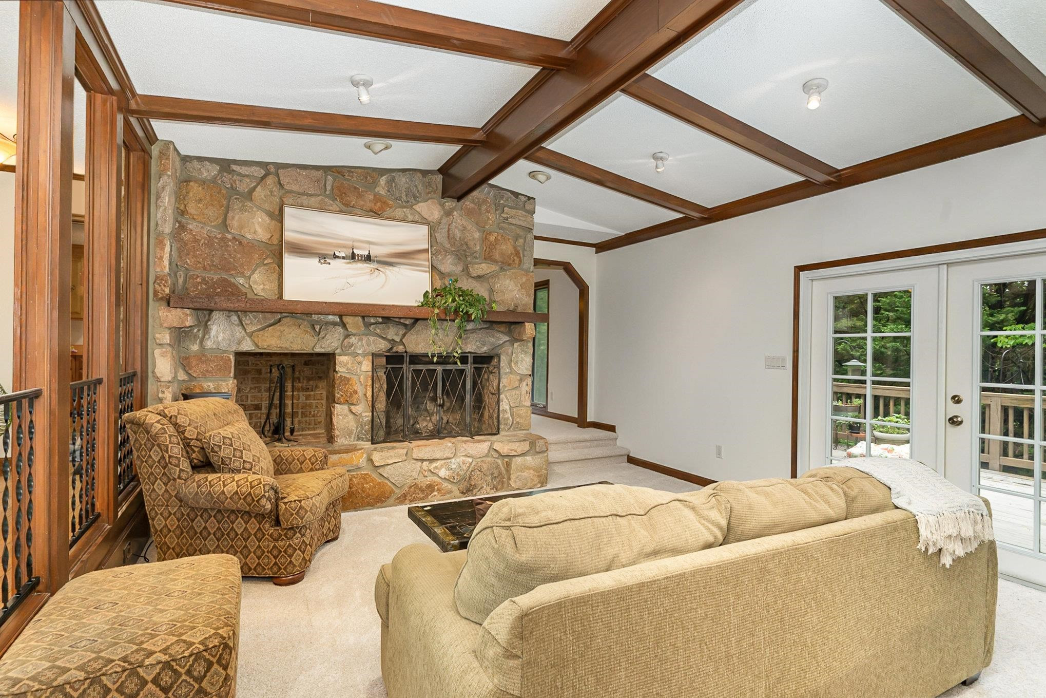 425 Sledge Road Louisburg, NC 27549 - Photo 5 of 30 a living room with furniture and a fireplace