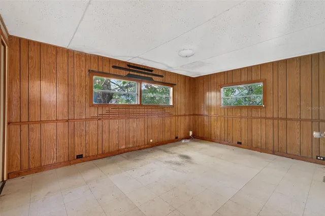 an empty room with windows