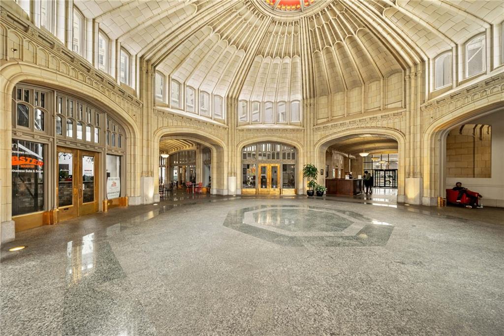 57 Forsyth Street Northwest, Unit 16G Atlanta, GA 30303 - Photo 5 of 32 a group of cars parked in front of a building