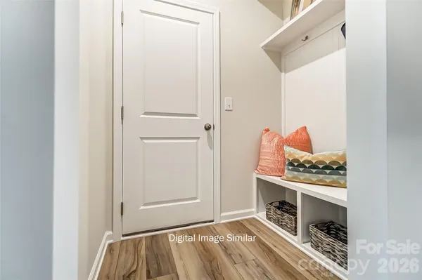 a bedroom with a bed and a fireplace