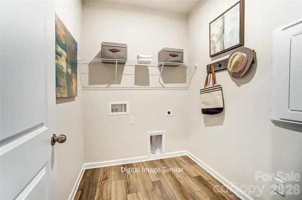 a view of a bedroom with bed and hallway