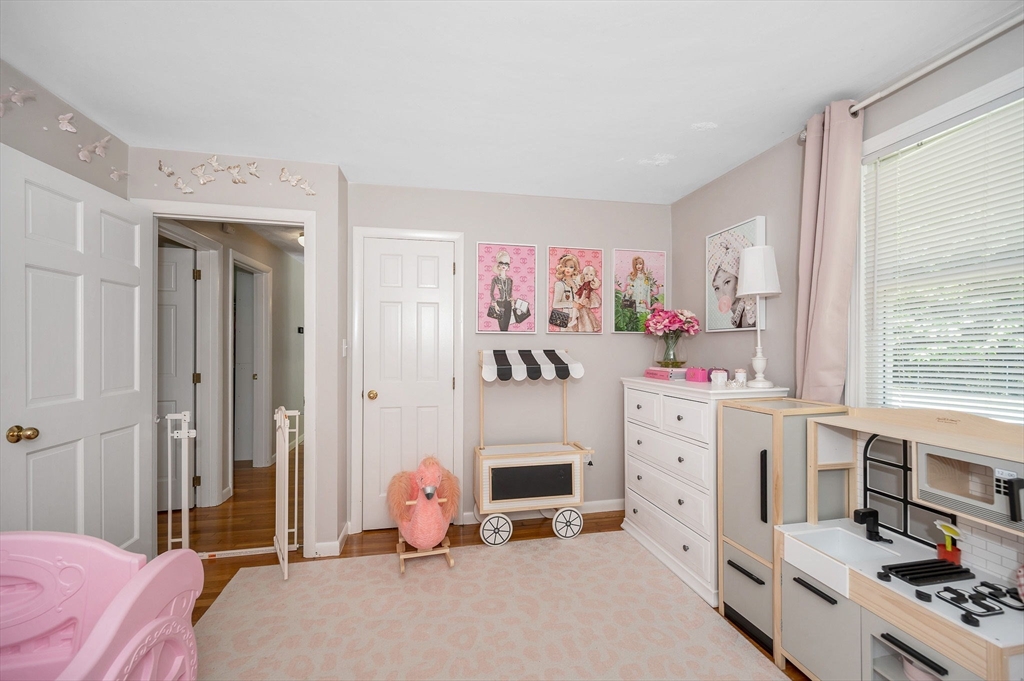 5 Silverbirch Road Billerica, MA 01821 - Photo 24 of 36 a bedroom with a bed and a window