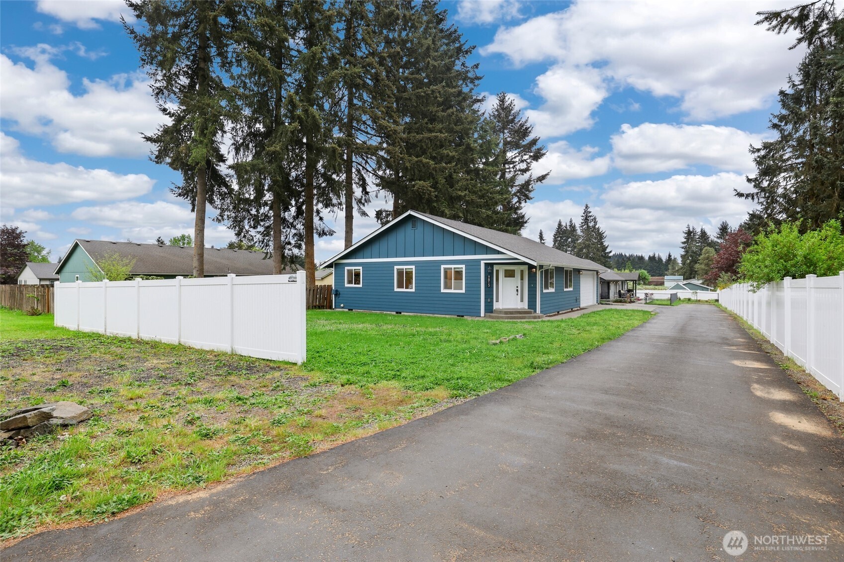 9815 178th Way Southwest Rochester, WA 98579 - Photo 1 of 36 a front view of house with yard and green space