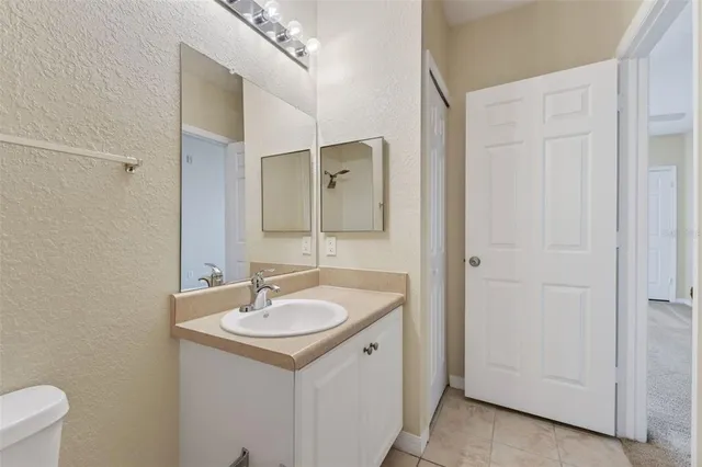 a view of a swimming pool with chairs