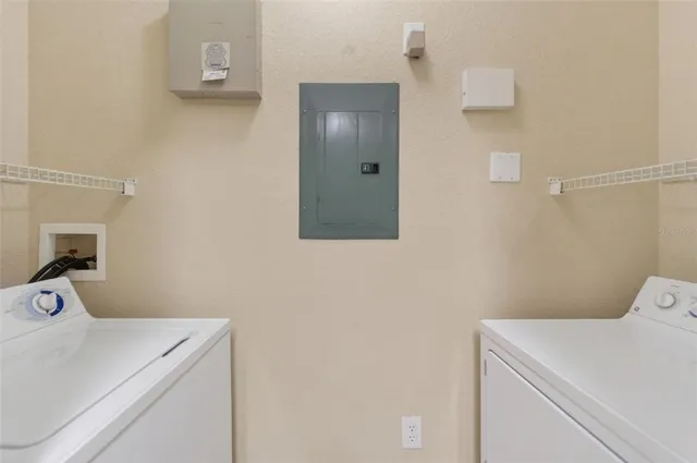 a swimming pool with outdoor seating and yard