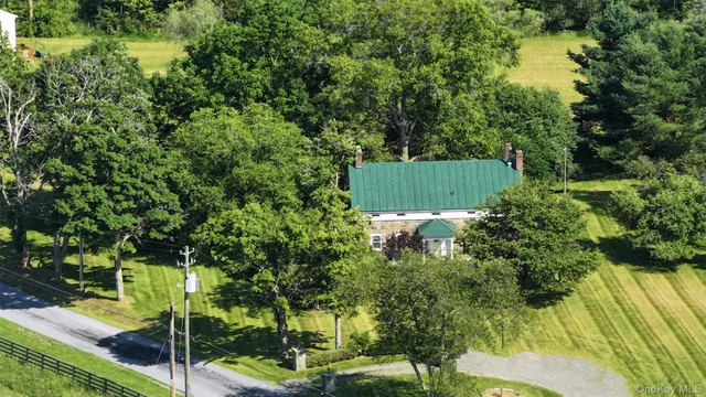 a view of a field with an outdoor space