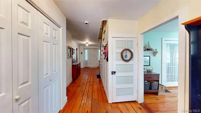 a view of hallway with washer and dryer