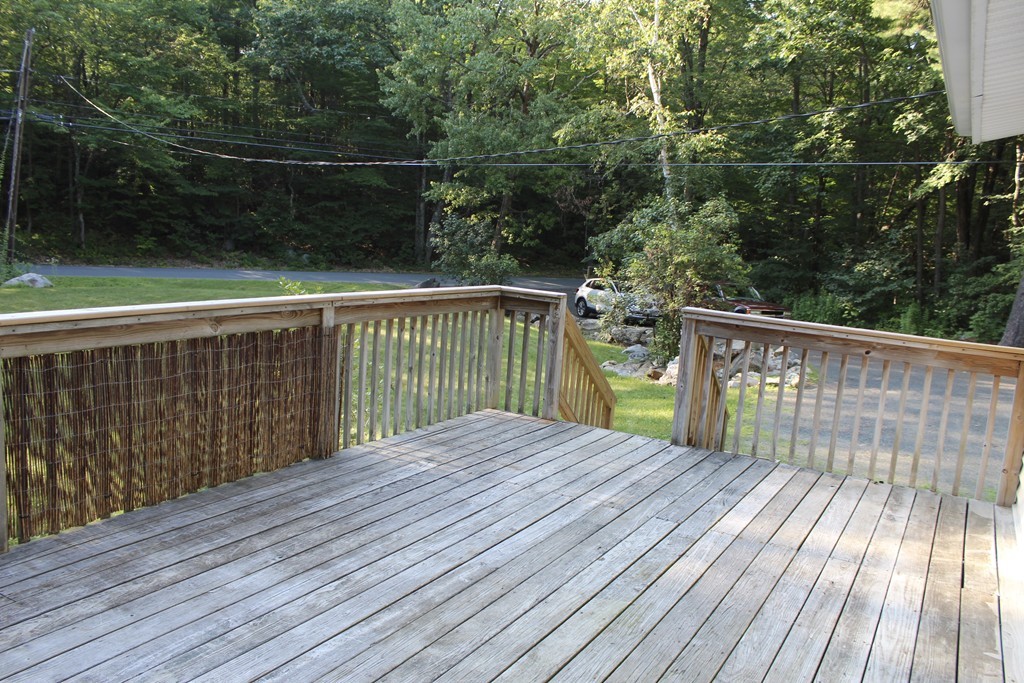 1663 Russell Road Montgomery, MA 01085 - Photo 14 of 17 a view of balcony with wooden floor
