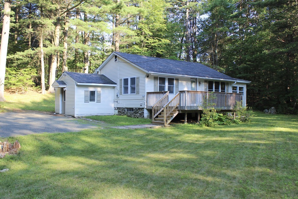 1663 Russell Road Montgomery, MA 01085 - Photo 17 of 17 a view of a house with a yard