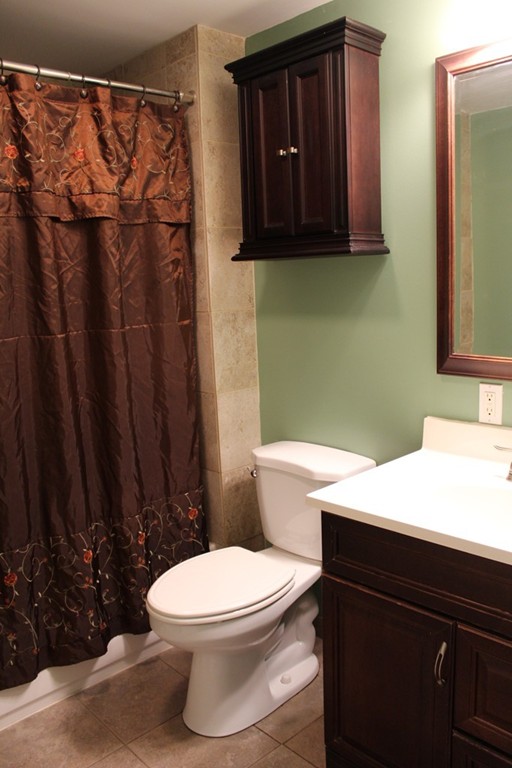 1663 Russell Road Montgomery, MA 01085 - Photo 8 of 17 a bathroom with a sink a toilet and shower