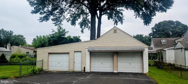 a front view of a house with a garage