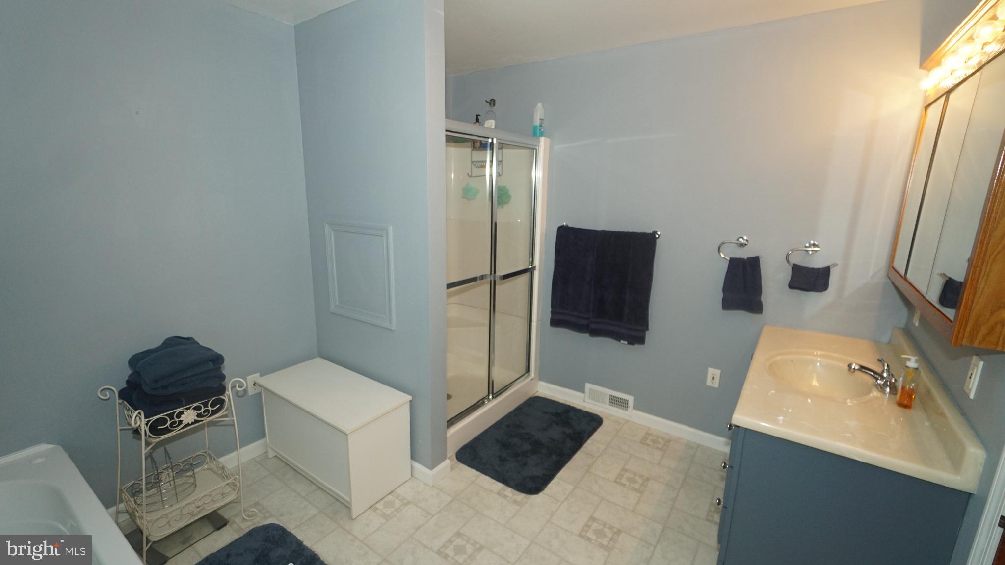 2307 State Rd. Croydon, PA 19021 - Photo 14 of 36 a bathroom with a sink and a mirror