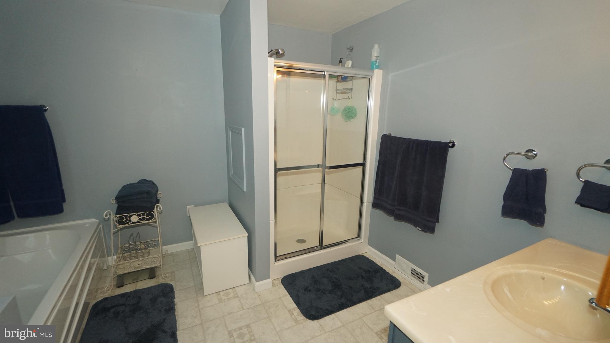 2307 State Rd. Croydon, PA 19021 - Photo 15 of 36 a bathroom with a sink and a mirror
