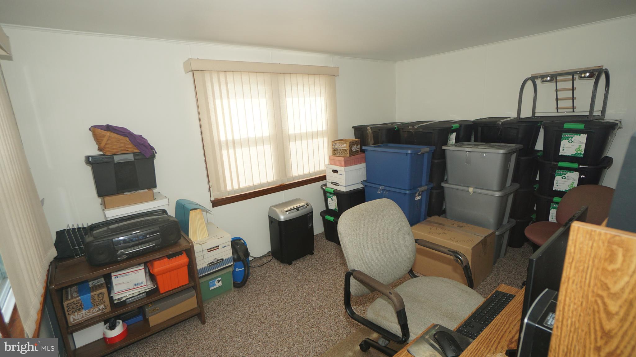 2307 State Rd. Croydon, PA 19021 - Photo 19 of 36 a living room with furniture and a window