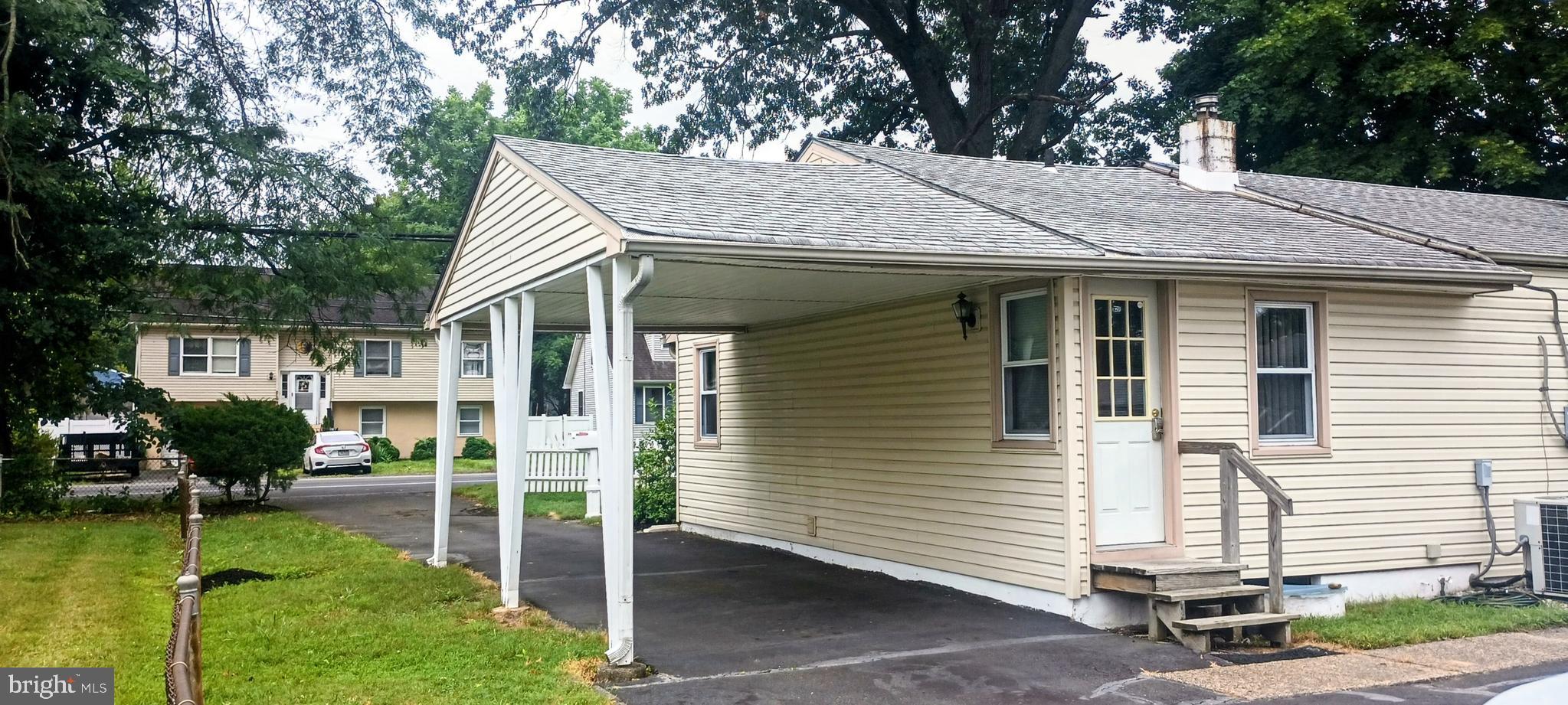 2307 State Rd. Croydon, PA 19021 - Photo 27 of 36 a view of a house with a yard chairs and table