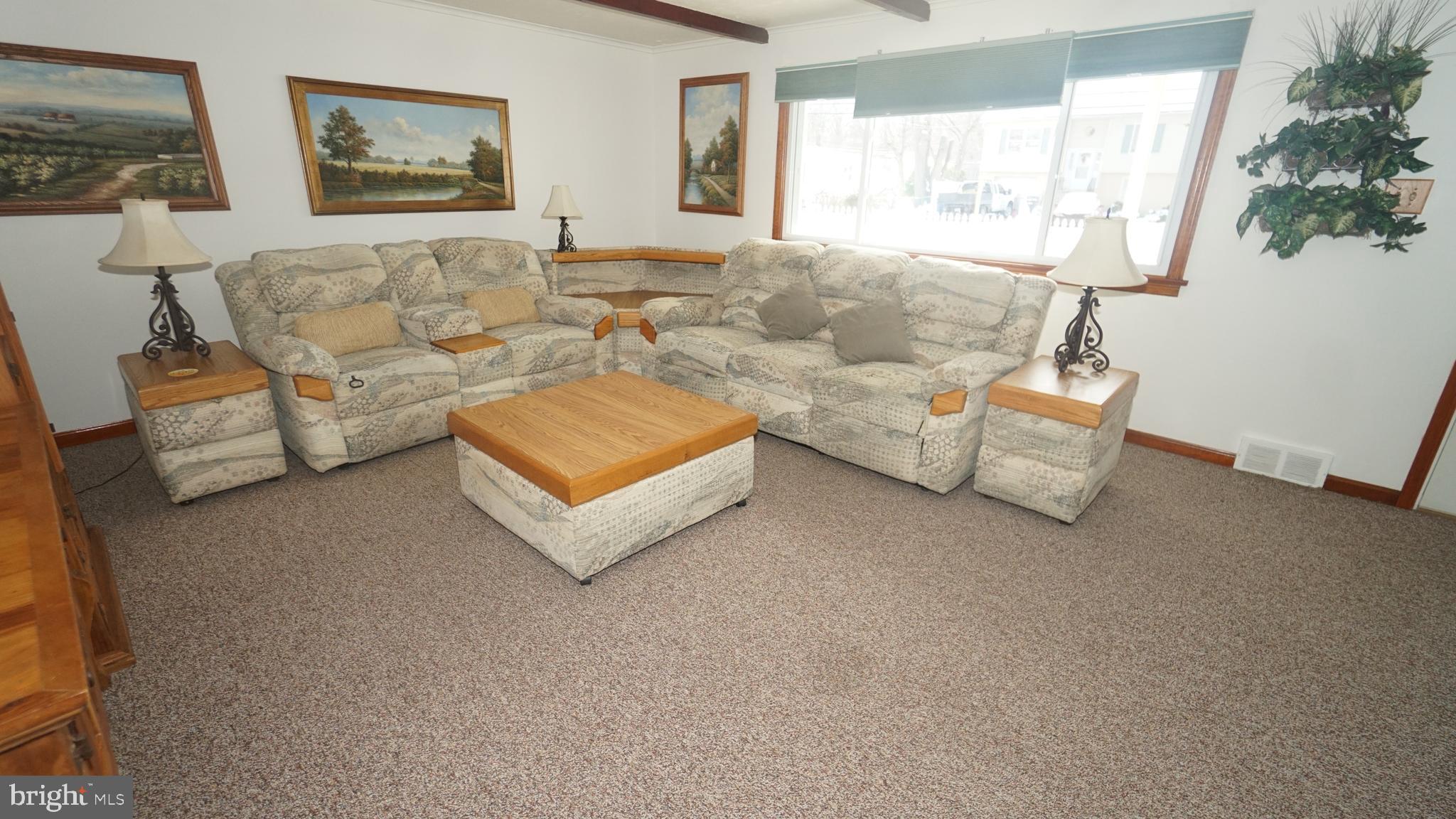 2307 State Rd. Croydon, PA 19021 - Photo 3 of 36 a living room with furniture and a large window