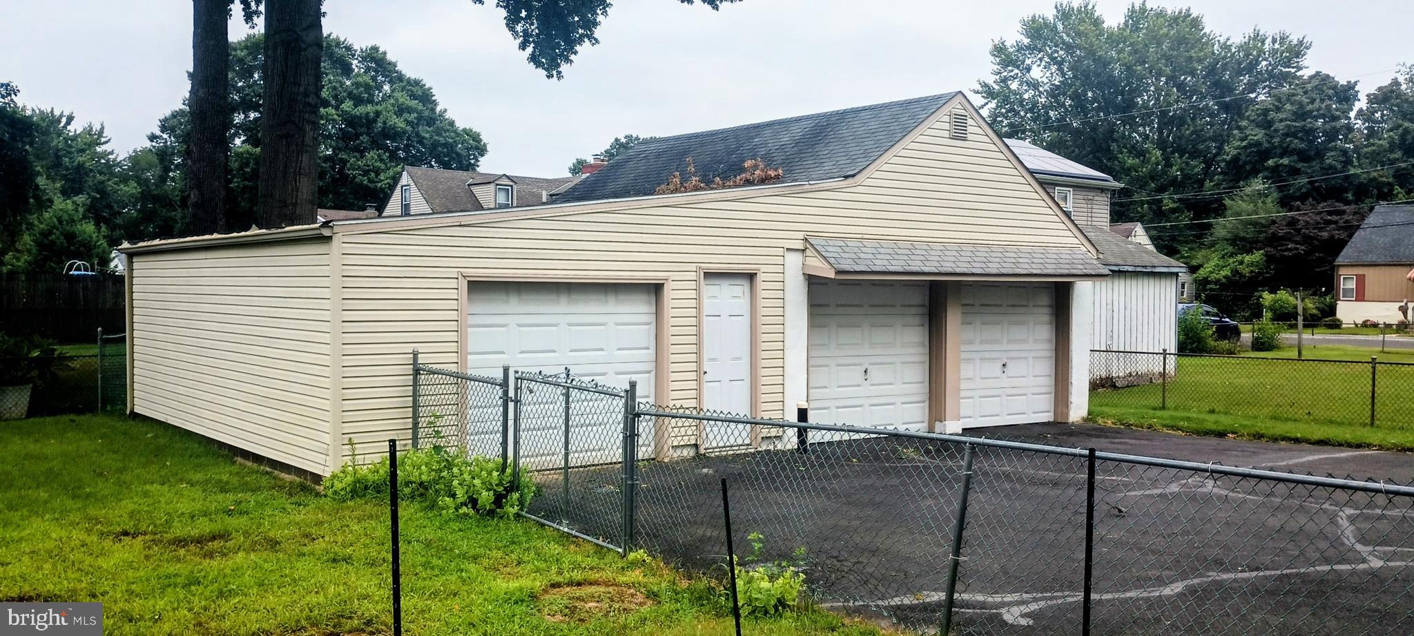 2307 State Rd. Croydon, PA 19021 - Photo 32 of 36 a front view of a house with garden