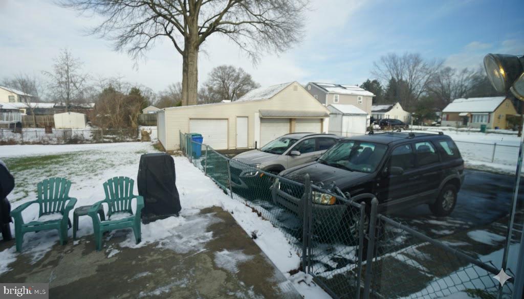 2307 State Rd. Croydon, PA 19021 - Photo 35 of 36 a view of a patio with table and chairs and potted plants