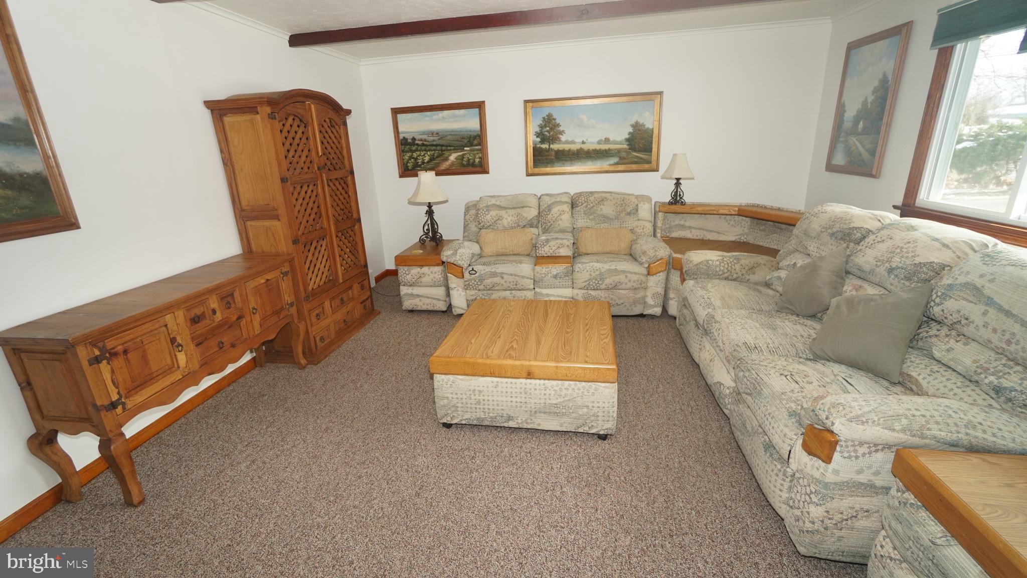 2307 State Rd. Croydon, PA 19021 - Photo 5 of 36 a living room with furniture and a window