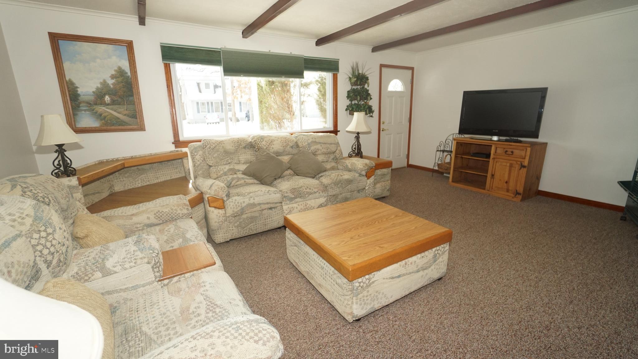 2307 State Rd. Croydon, PA 19021 - Photo 6 of 36 a living room with furniture and a flat screen tv