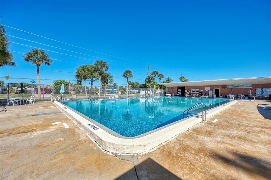 548 Morningside Road Venice, FL 34293 - Photo 6 of 22 a view of a swimming pool with a patio