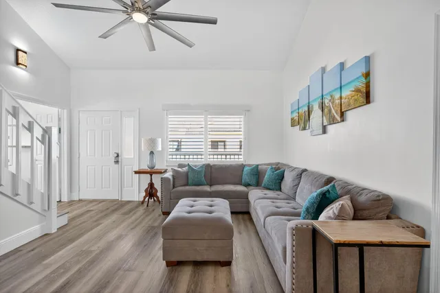 a living room with furniture or couch and a flat screen tv