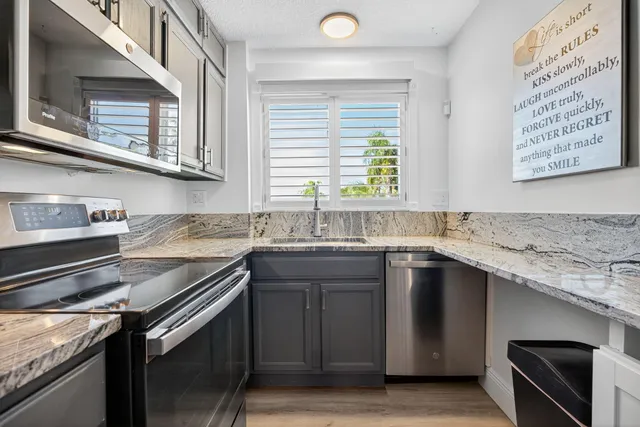 a bedroom with a large bed and a book shelf